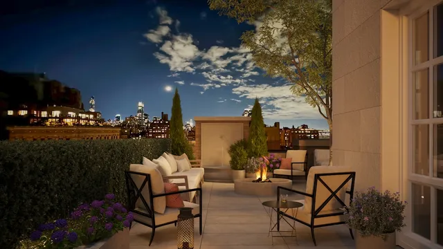 a view of a chairs and table in a patio