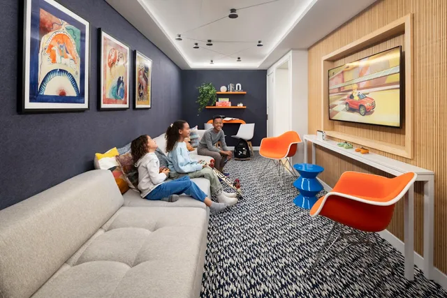 a workspace with furniture and wooden floor