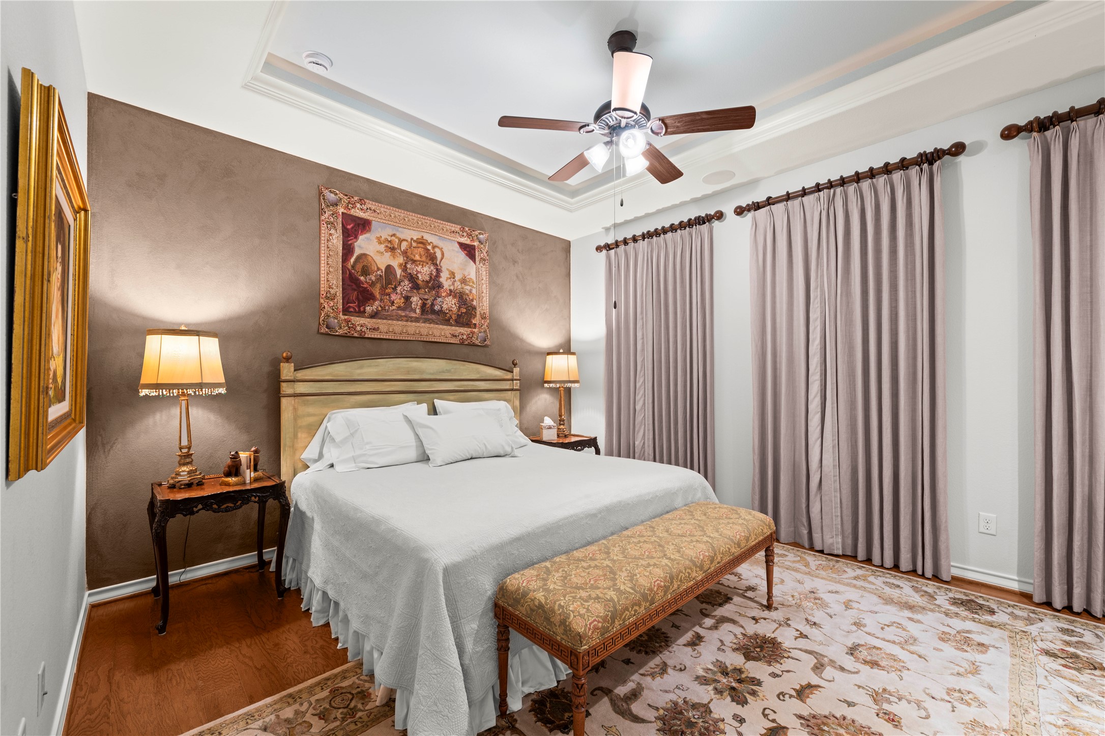 204 Adams Street Georgetown, TX 78628 - Photo 17 of 33 Hardwood flooring and a decorative ceiling fan.