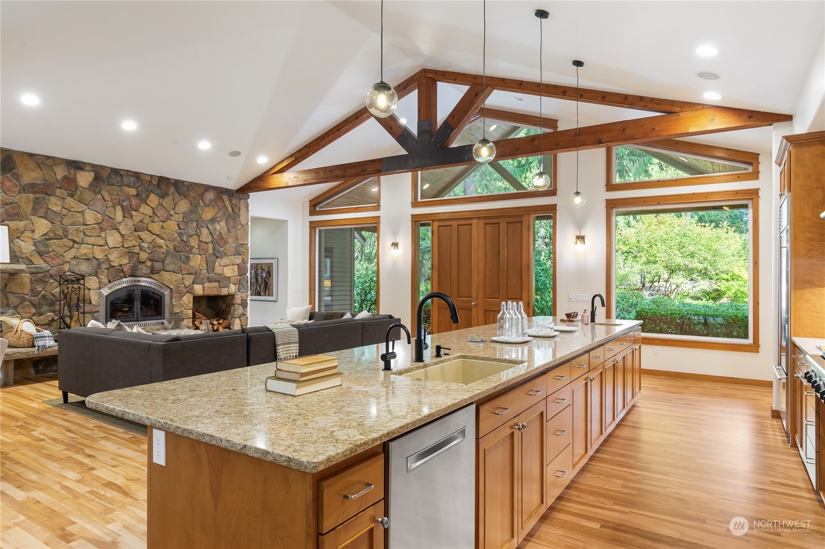 11417 Kelly Road Northeast Carnation, WA 98014 - Photo 11 of 38 a kitchen with sink a counter top space and living room view