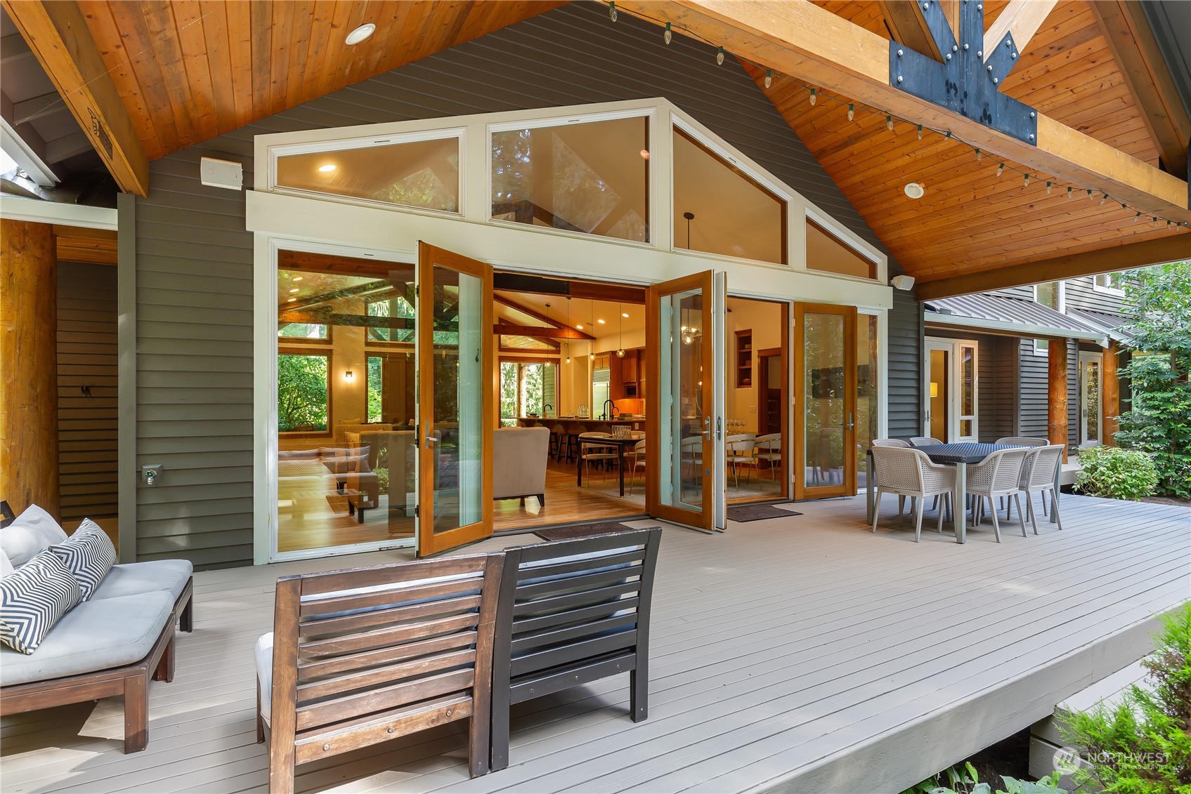 11417 Kelly Road Northeast Carnation, WA 98014 - Photo 16 of 38 a view of a chairs and table in the patio