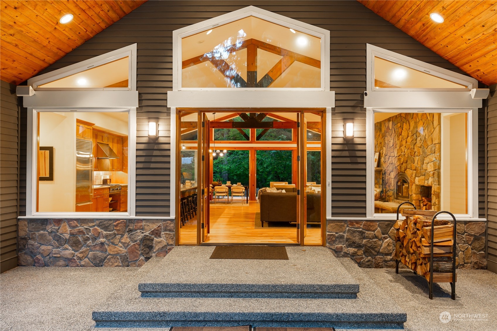 11417 Kelly Road Northeast Carnation, WA 98014 - Photo 2 of 38 a living room with large windows