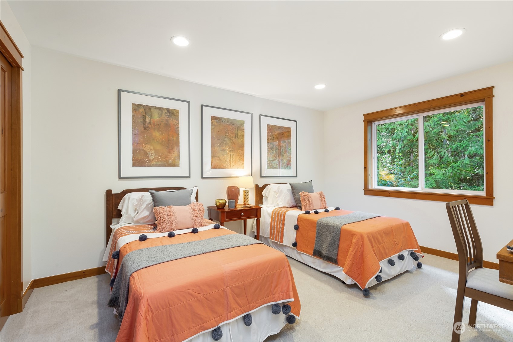 11417 Kelly Road Northeast Carnation, WA 98014 - Photo 25 of 38 a bedroom with two beds and a large window