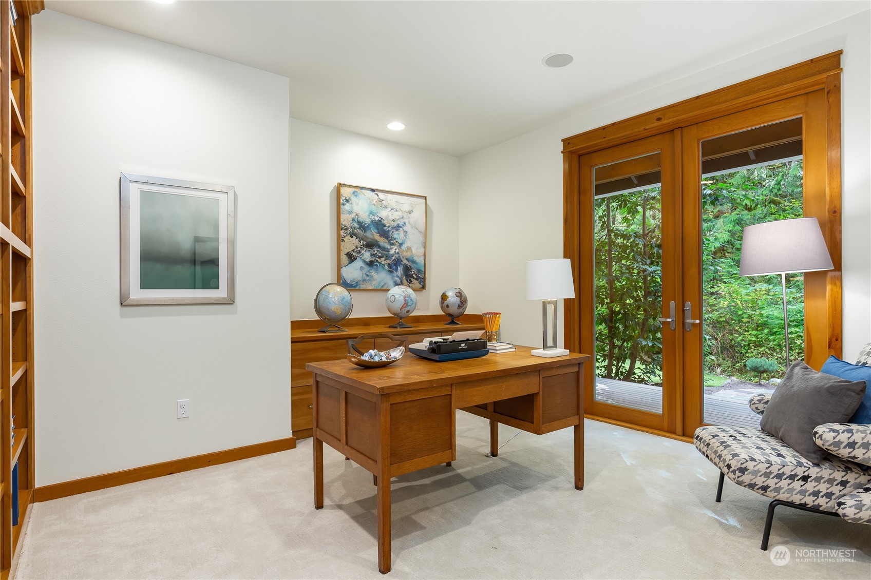 11417 Kelly Road Northeast Carnation, WA 98014 - Photo 27 of 38 a living room with furniture and a window