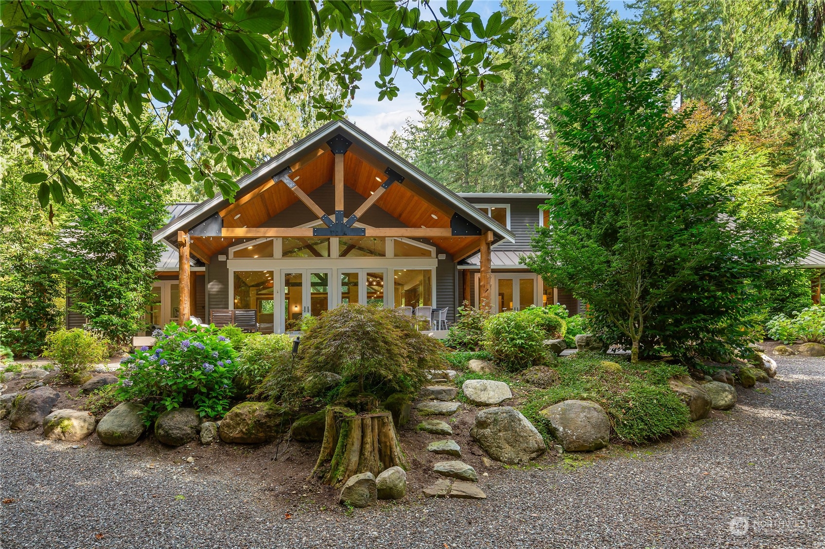 11417 Kelly Road Northeast Carnation, WA 98014 - Photo 31 of 38 a front view of a house with a yard