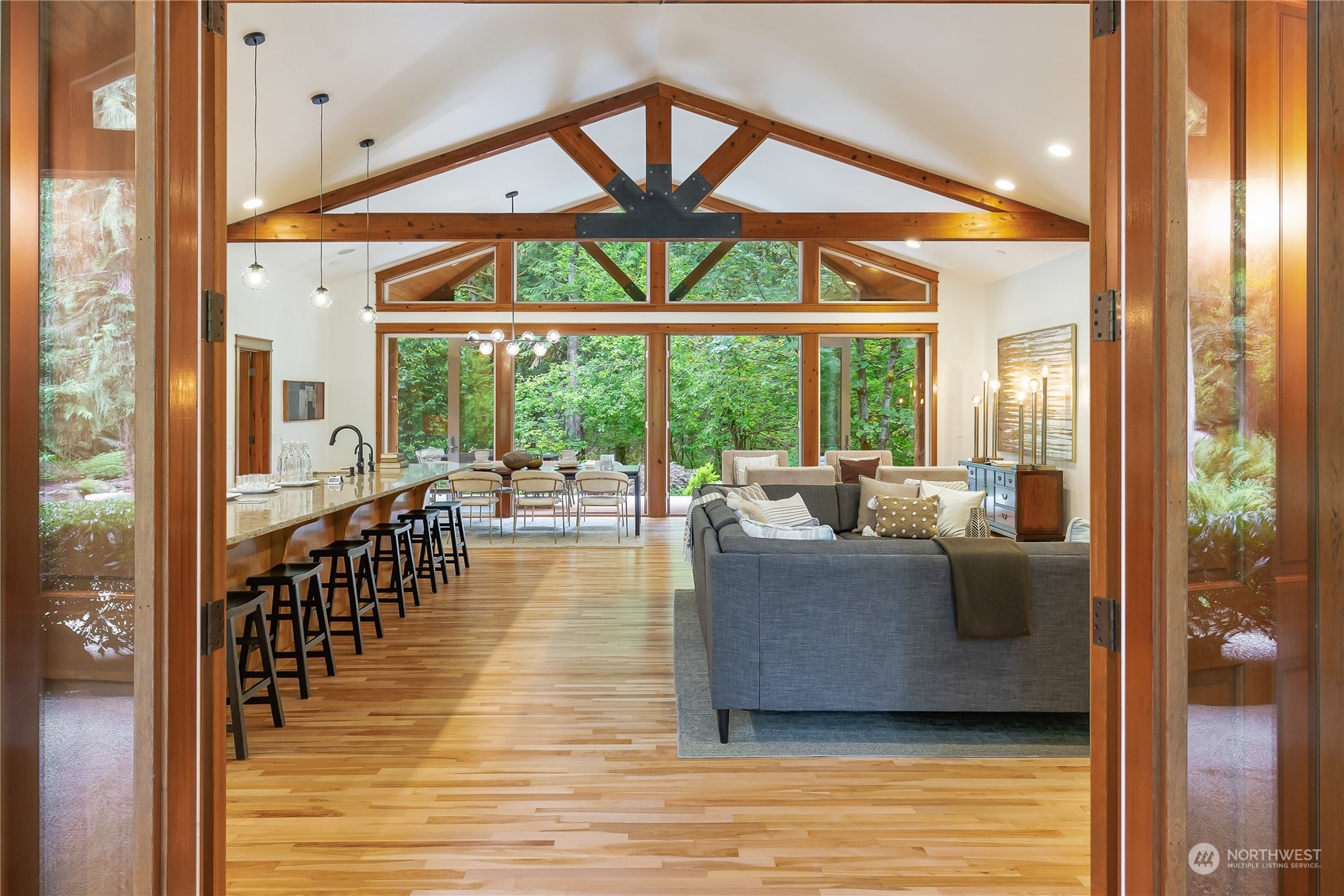 11417 Kelly Road Northeast Carnation, WA 98014 - Photo 5 of 38 a living room with furniture and a large window