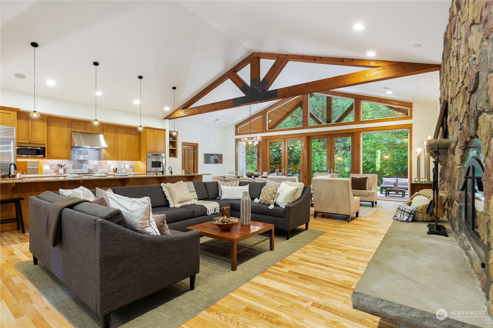 11417 Kelly Road Northeast Carnation, WA 98014 - Photo 8 of 38 a living room with furniture and a large window