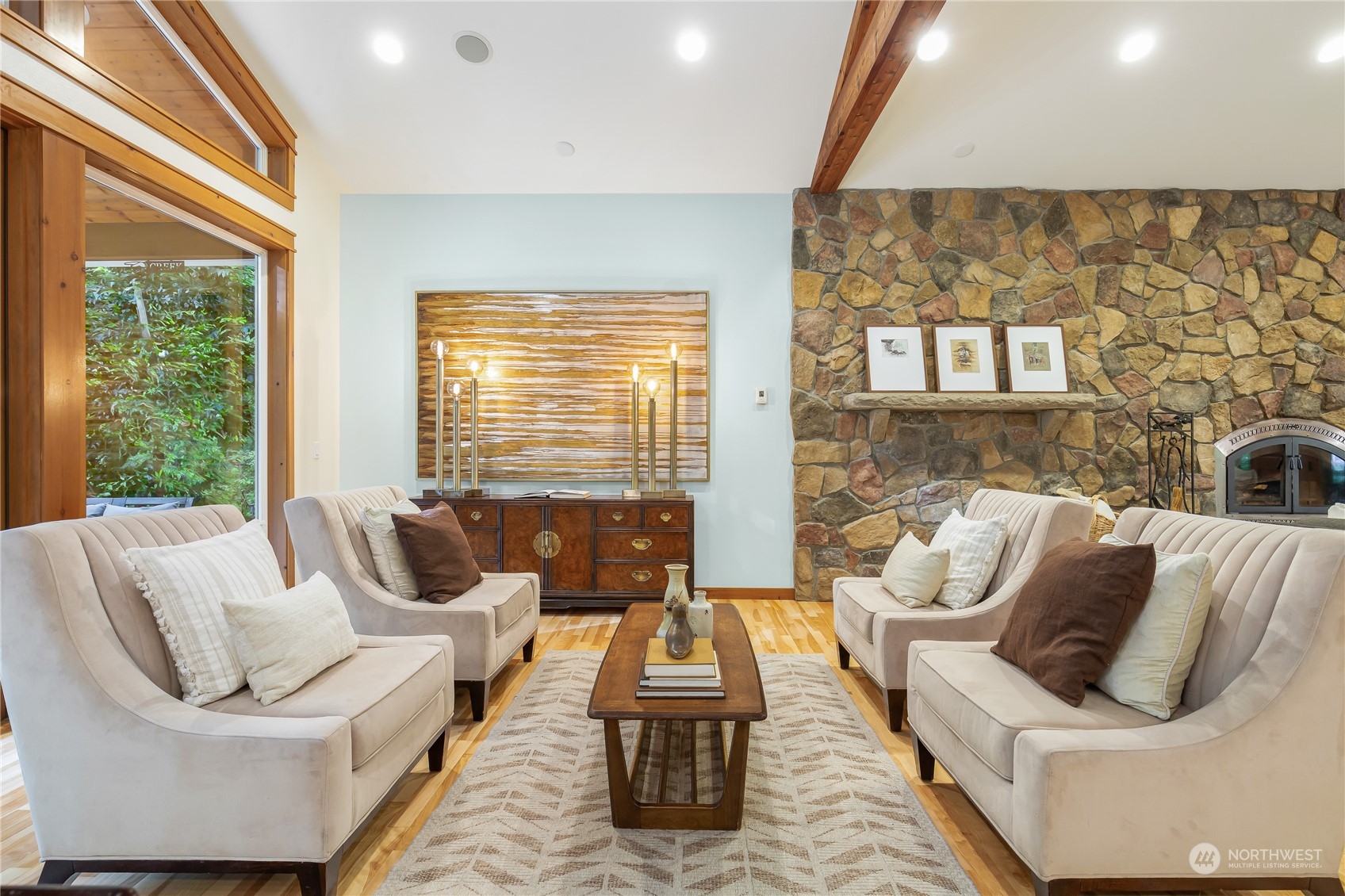 11417 Kelly Road Northeast Carnation, WA 98014 - Photo 9 of 38 a living room with furniture and a fireplace