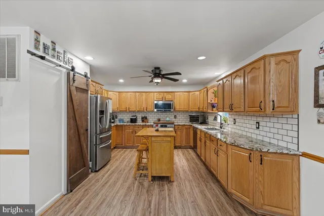 a bed room with furniture and a window