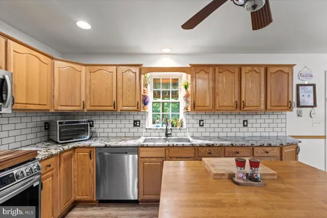 a bedroom with a bed and a desk