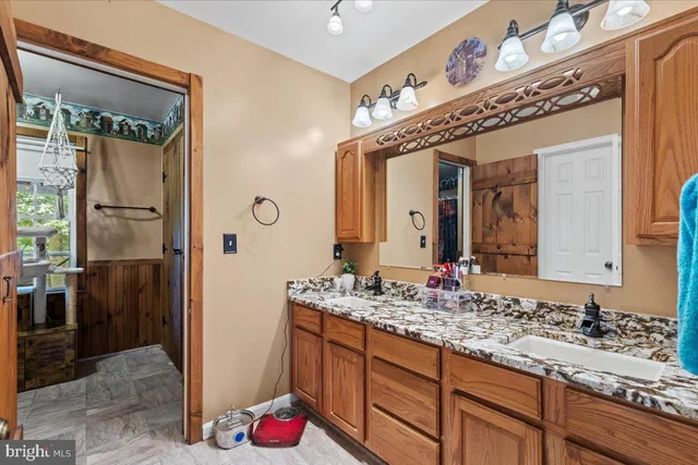 a view of backyard with deck and wooden floor