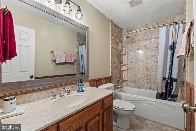 a view of outdoor space with swimming pool and green space