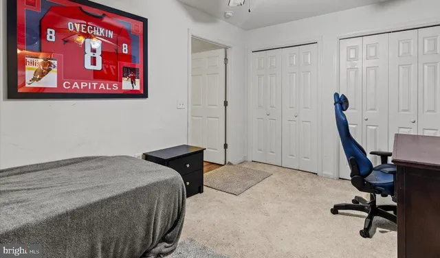 a view of yard with swimming pool and green space