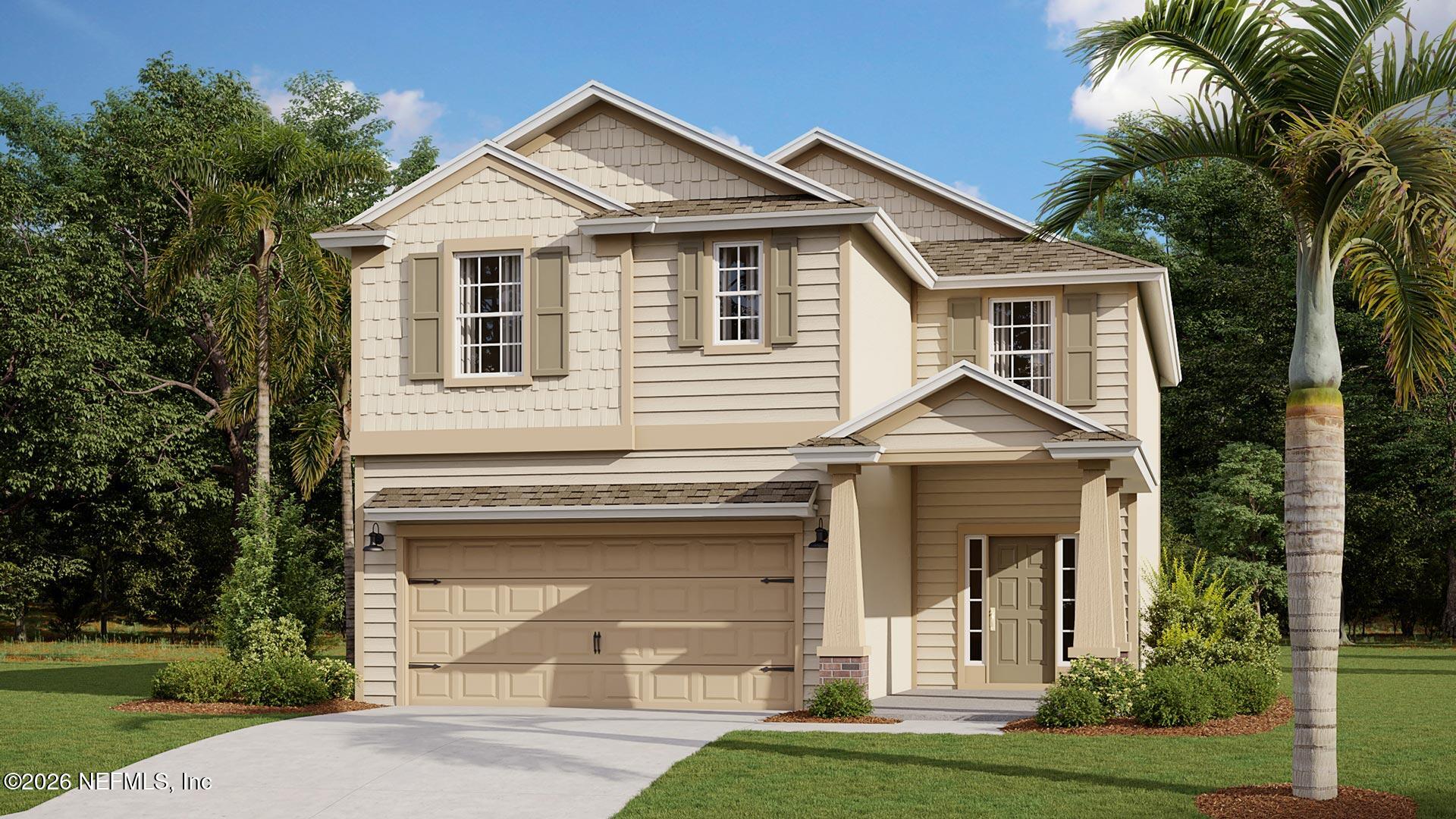 360 Chambers Avenue Yulee, FL 32097 - Photo 1 of 19 a front view of a house with a yard and garage