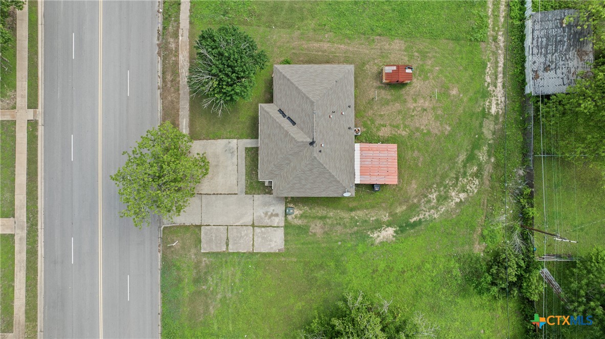 208 North 8th Street Temple, TX 76501 - Photo 13 of 13 an aerial view of residential house with outdoor space and trees all around