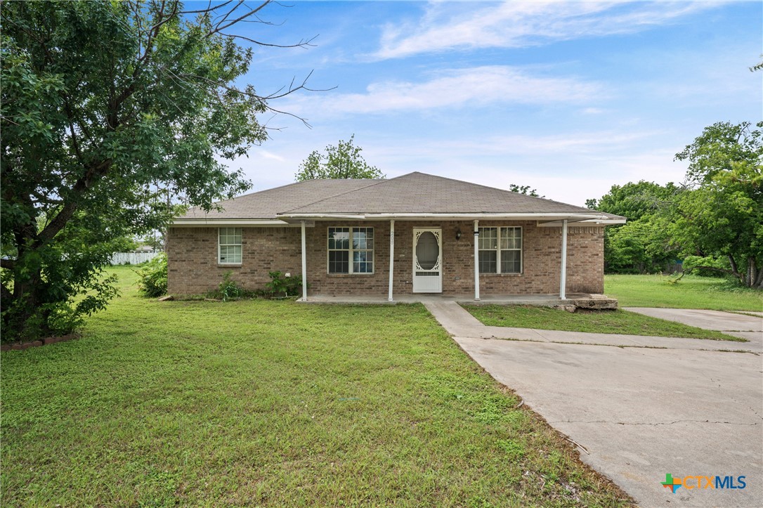 208 North 8th Street Temple, TX 76501 - Photo 2 of 13 front view of a house with a yard