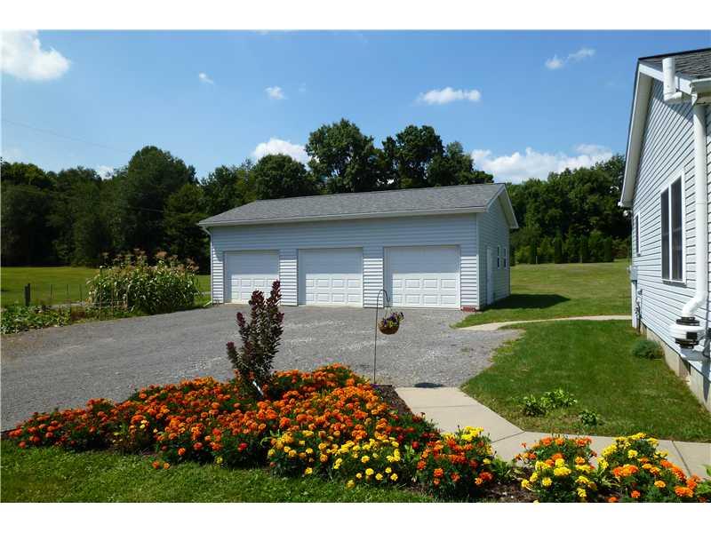 413 Coolspring Church Road Mercer, PA 16137 - Photo 13 of 15 Other. 11 foot ground to eves provides lots of headroom for working on cars.
