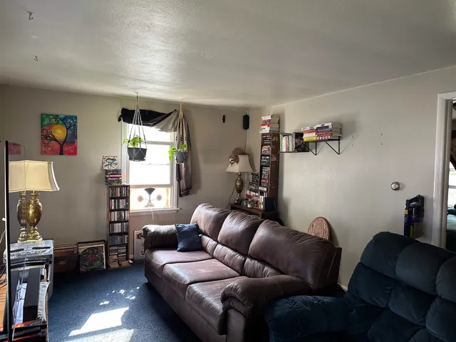 a living room with furniture and a couch