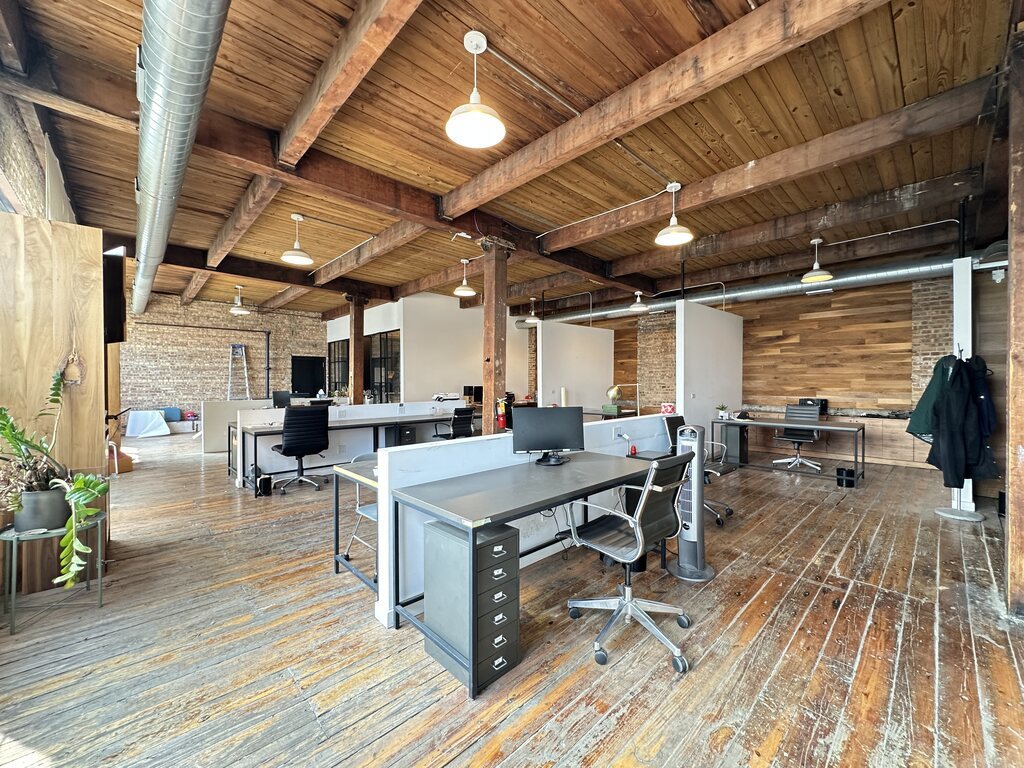 3124 West Carroll Avenue, Unit 2F Chicago, IL 60612 - Photo 13 of 20 a view of a patio with table and chairs barbeque with wooden floor