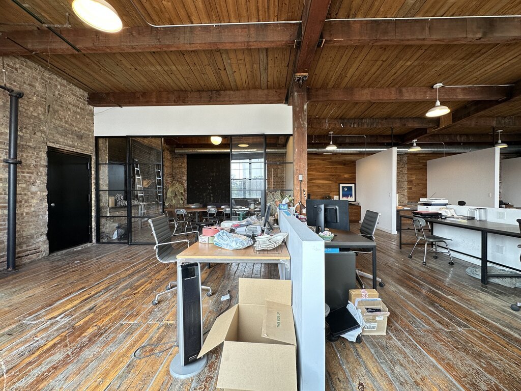 3124 West Carroll Avenue, Unit 2F Chicago, IL 60612 - Photo 14 of 20 a view of a dining hall with furniture and wooden floor