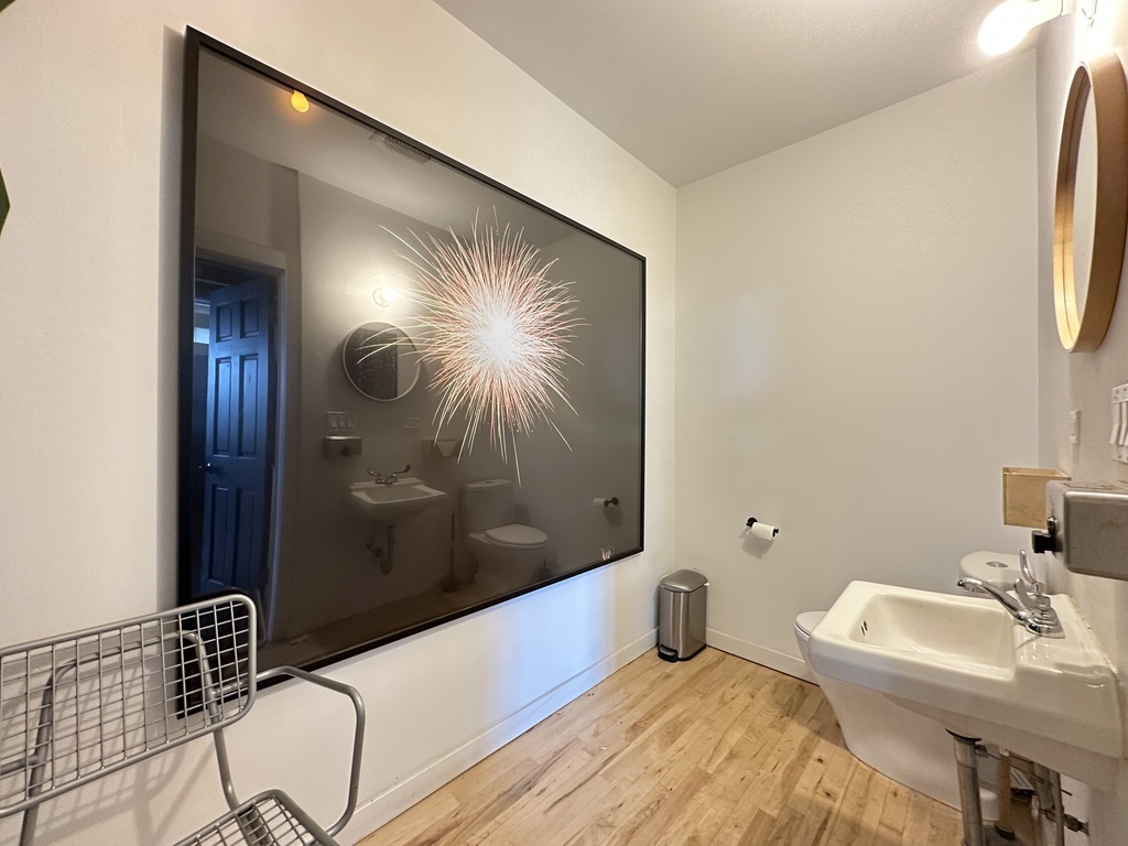 3124 West Carroll Avenue, Unit 2F Chicago, IL 60612 - Photo 19 of 20 a bathroom with a sink and a mirror