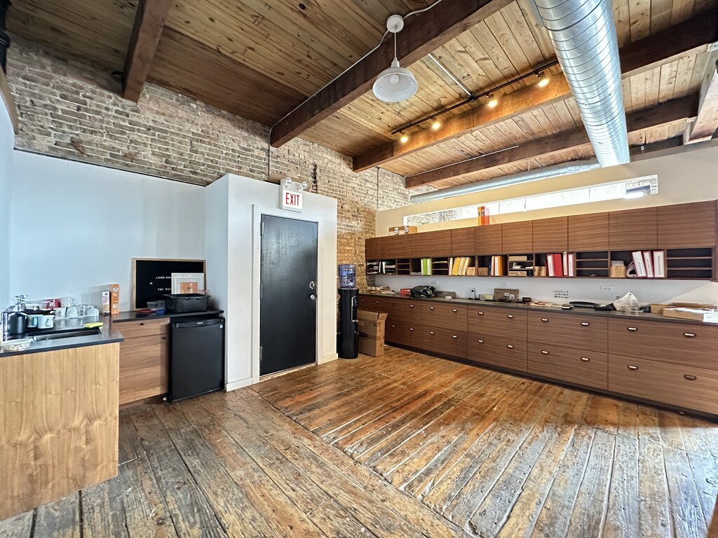 3124 West Carroll Avenue, Unit 2F Chicago, IL 60612 - Photo 3 of 20 a kitchen with refrigerator and window