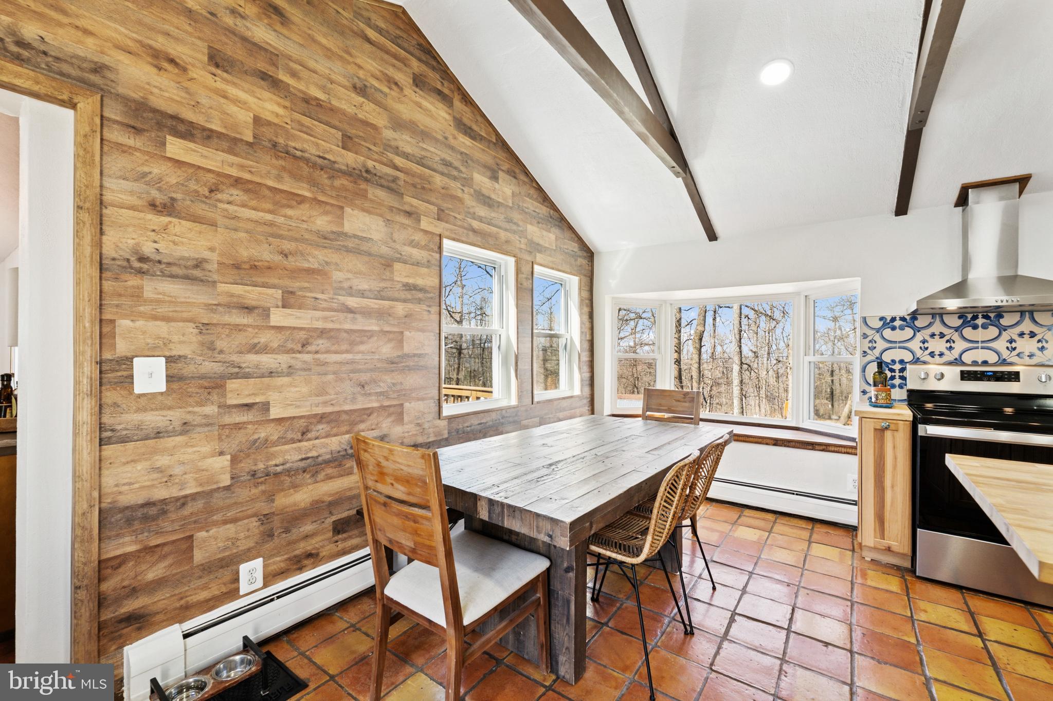 44 Luchase Road Linden, VA 22642 - Photo 12 of 52 a dining room with furniture and wooden floor