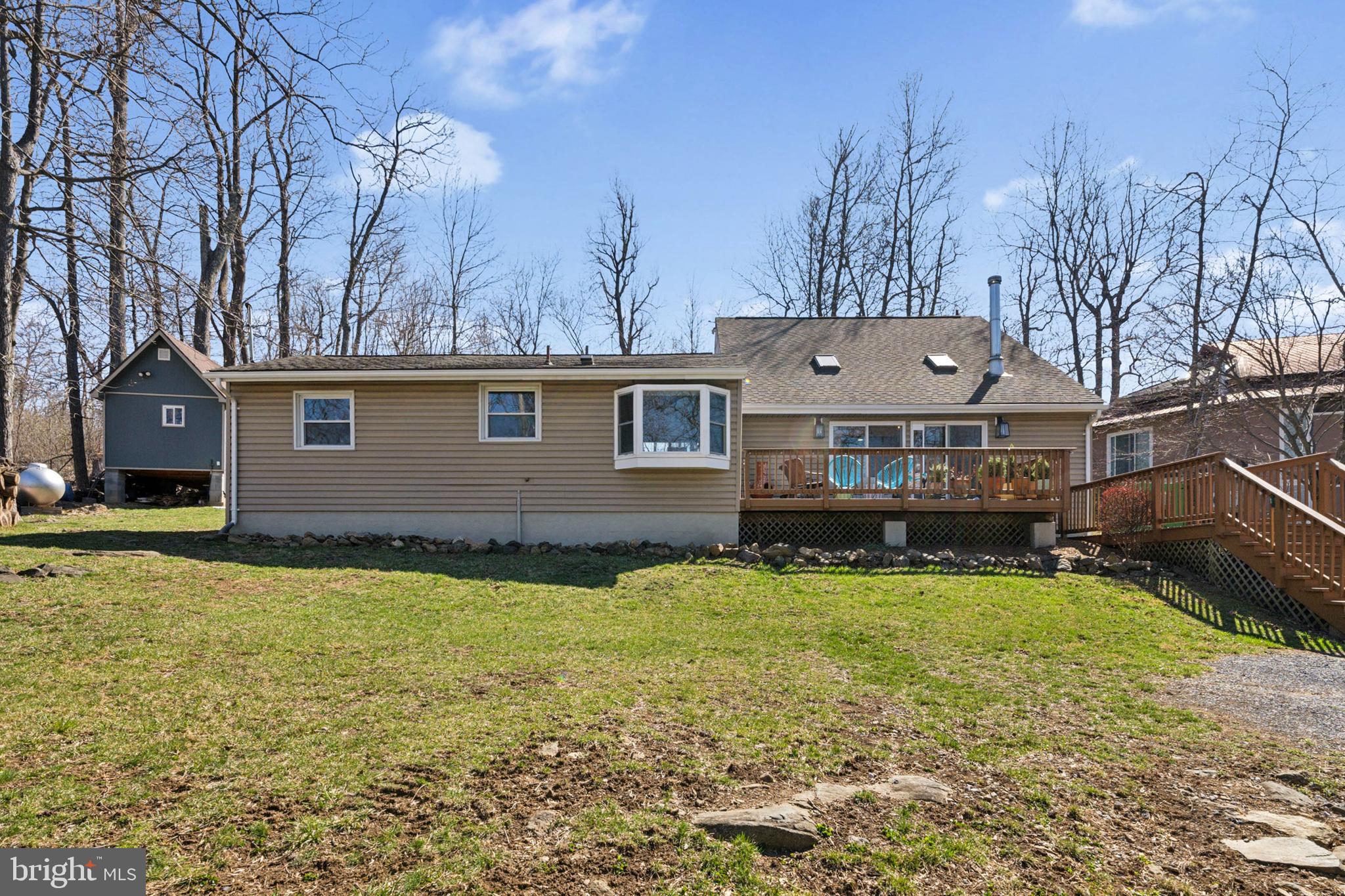 44 Luchase Road Linden, VA 22642 - Photo 2 of 52 a view of a house with backyard and sitting area