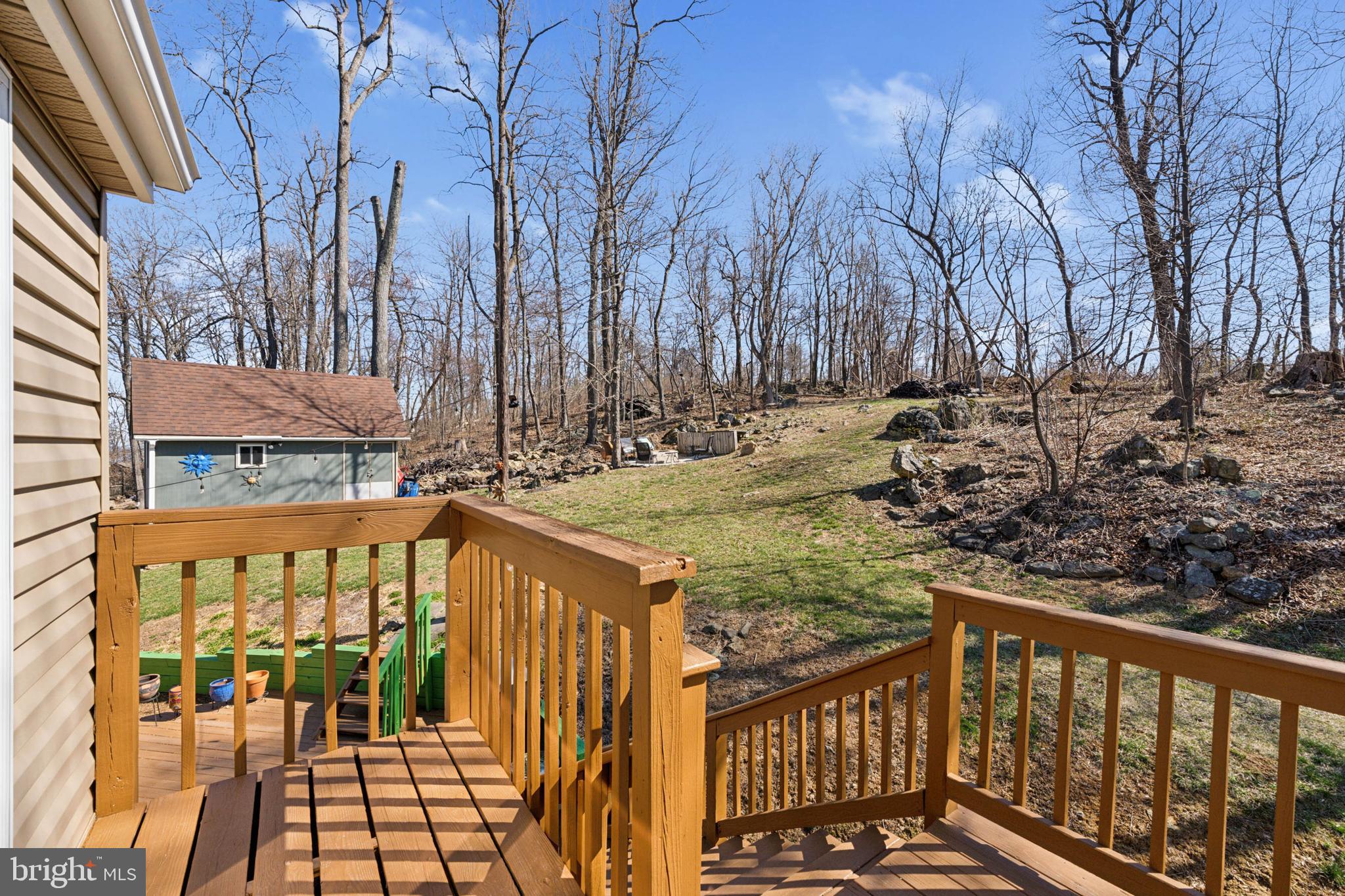 44 Luchase Road Linden, VA 22642 - Photo 32 of 52 a view of a brick house with large trees