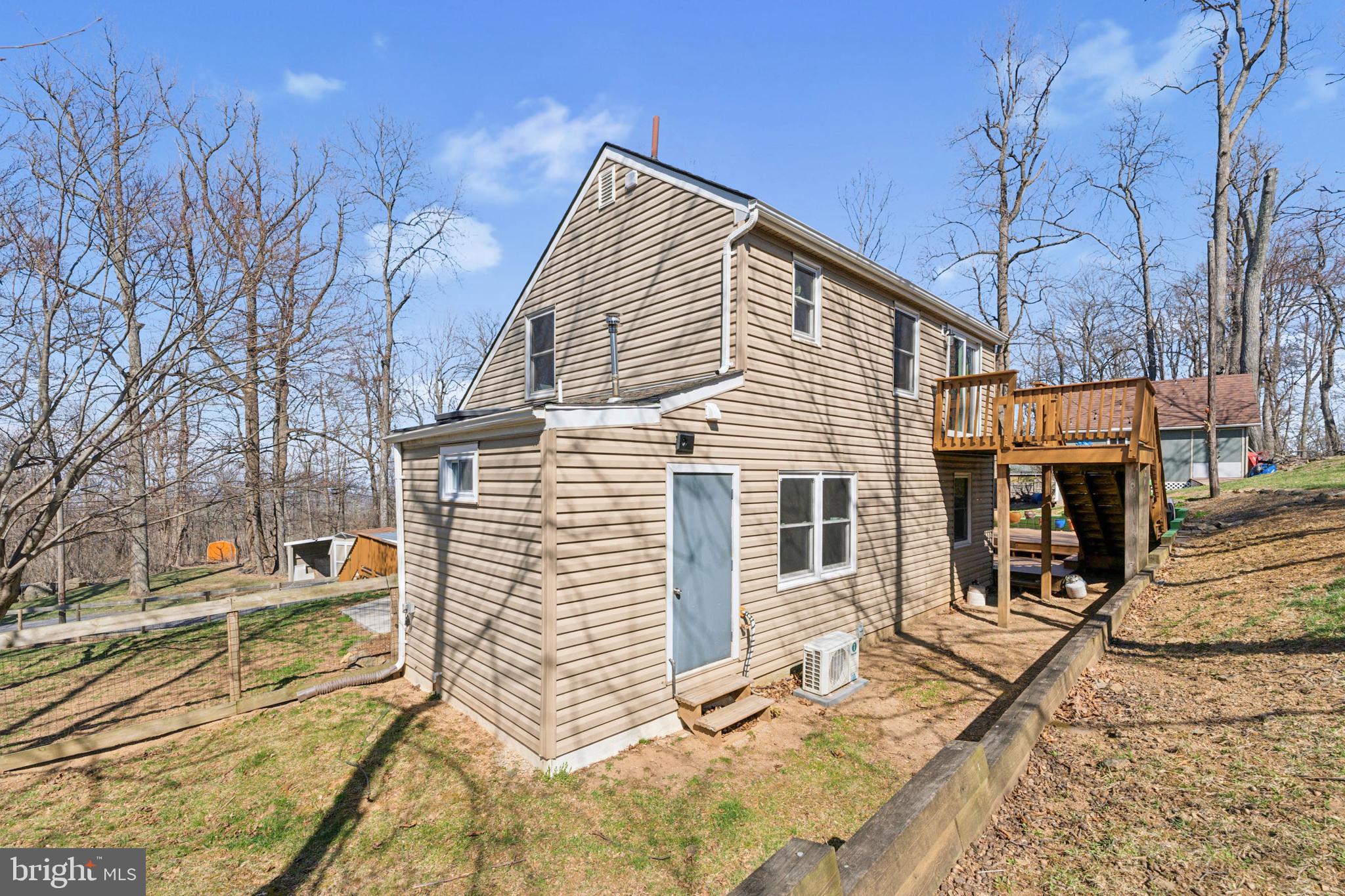 44 Luchase Road Linden, VA 22642 - Photo 37 of 52 a view of residential house with wooden fence