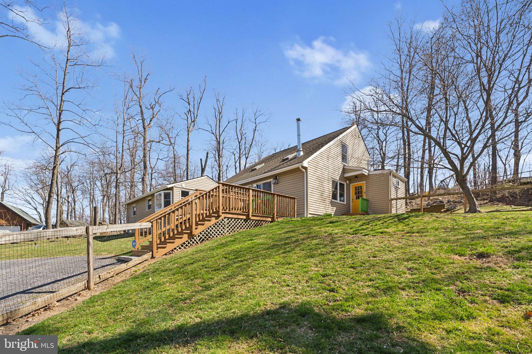 44 Luchase Road Linden, VA 22642 - Photo 39 of 52 a view of an house with backyard and trees