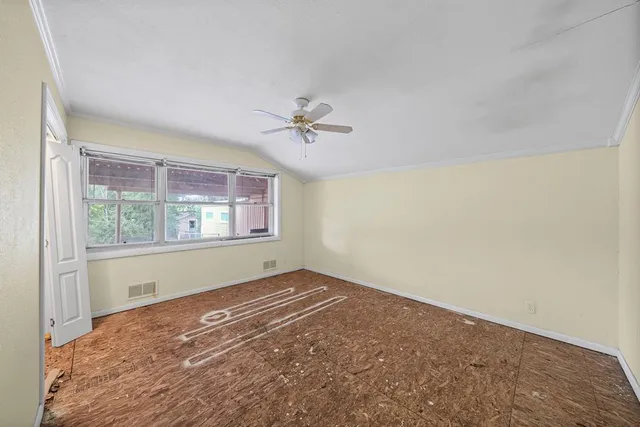 a bedroom with a bed and closet