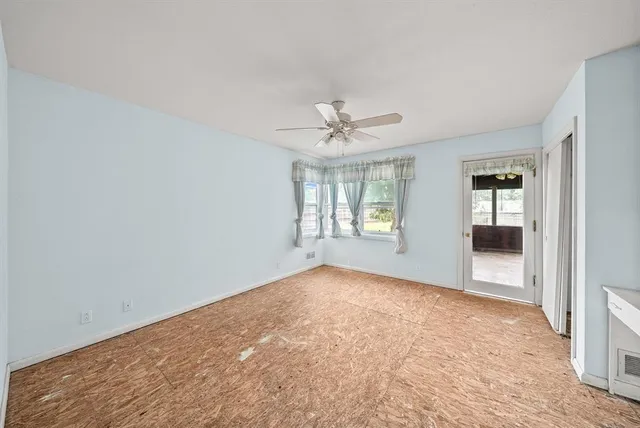 a view of a porch with wooden floor and outdoor space