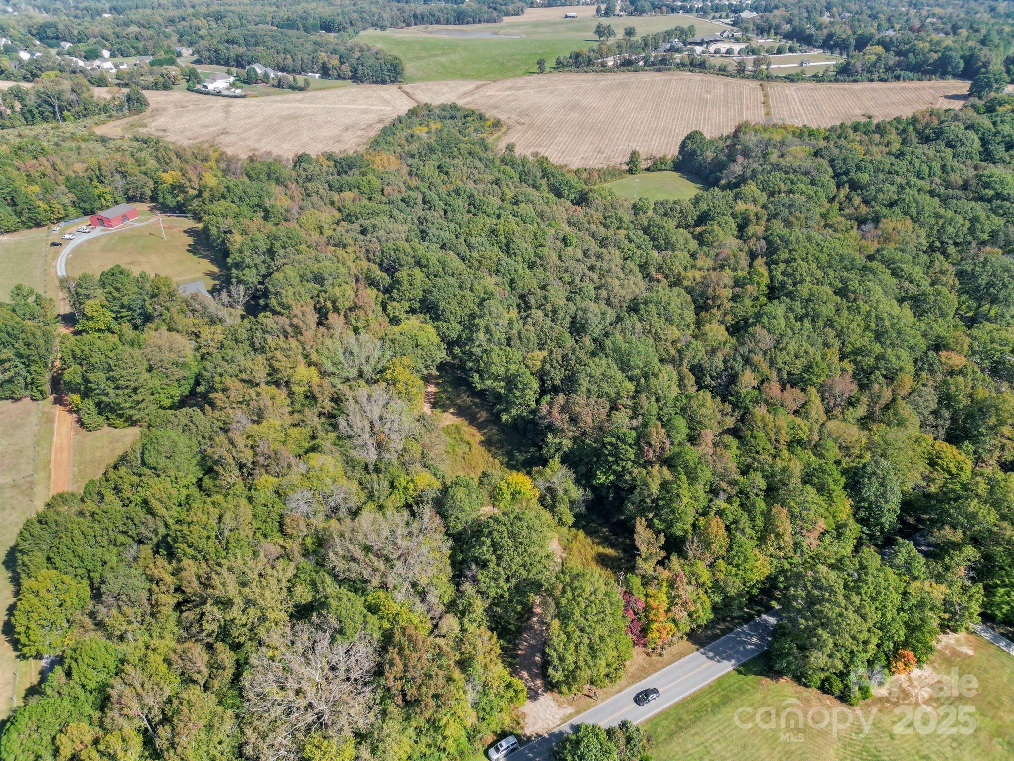 5908 Will Plyler Road Waxhaw, NC 28173 - Photo 5 of 12 an aerial view of a houses with yard