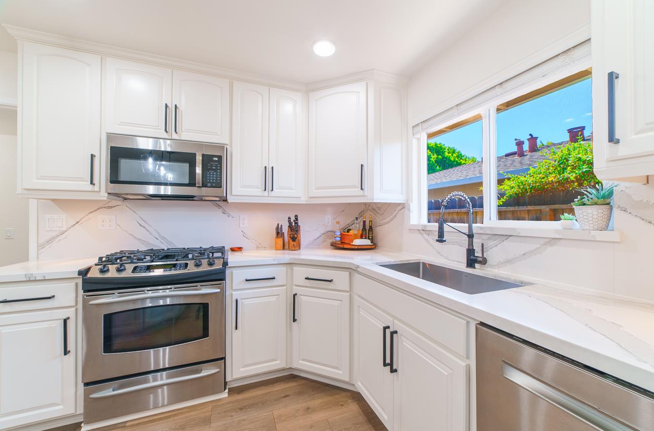 731 La Mesa Drive Salinas, CA 93901 - Photo 14 of 43 a kitchen with cabinets stainless steel appliances and a sink