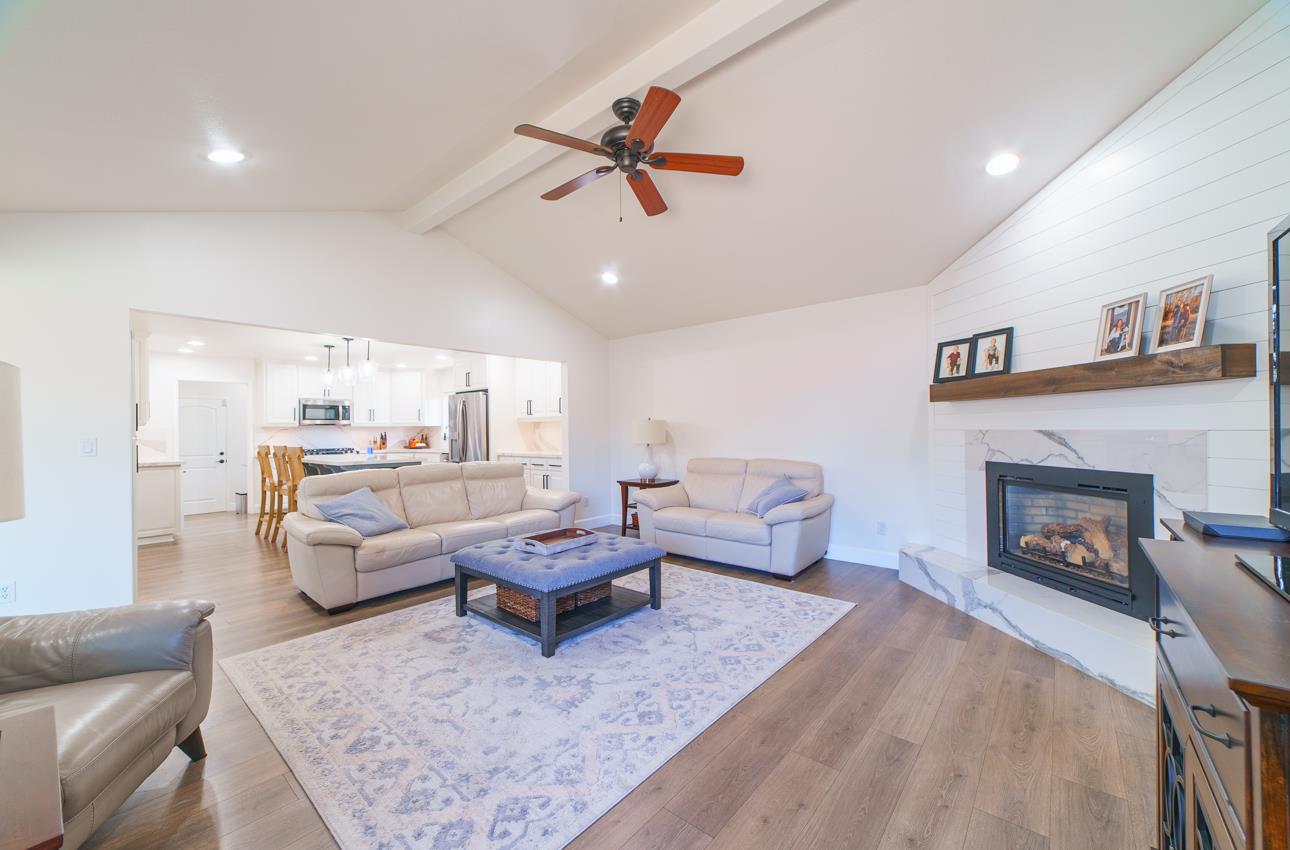 731 La Mesa Drive Salinas, CA 93901 - Photo 17 of 43 a living room with furniture and a fireplace