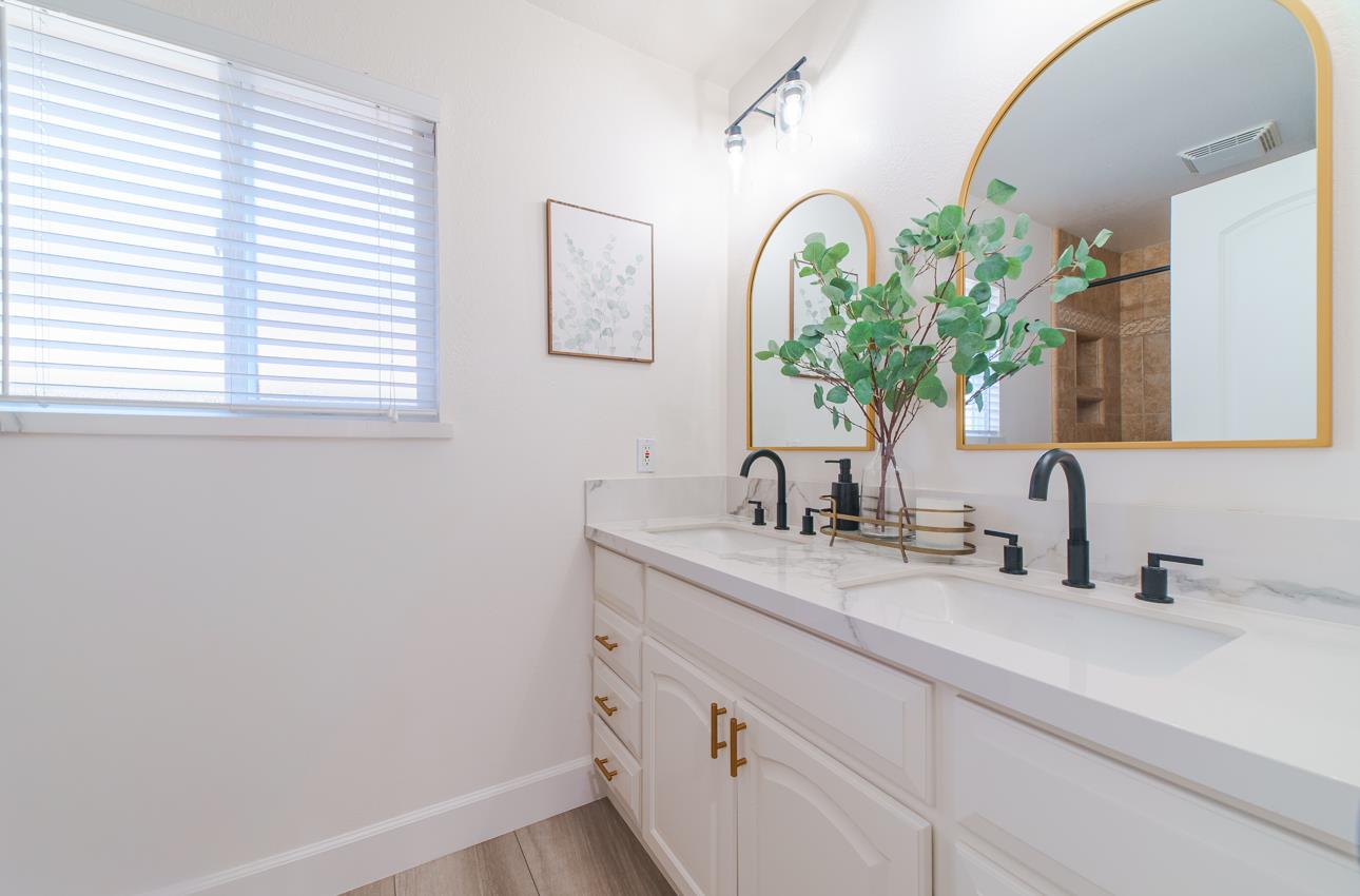 731 La Mesa Drive Salinas, CA 93901 - Photo 20 of 43 a bathroom with a sink and a mirror