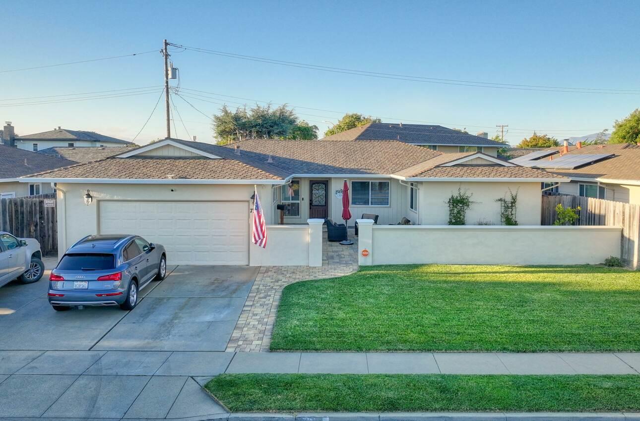 731 La Mesa Drive Salinas, CA 93901 - Photo 2 of 43 a front view of a house with a garden and trees