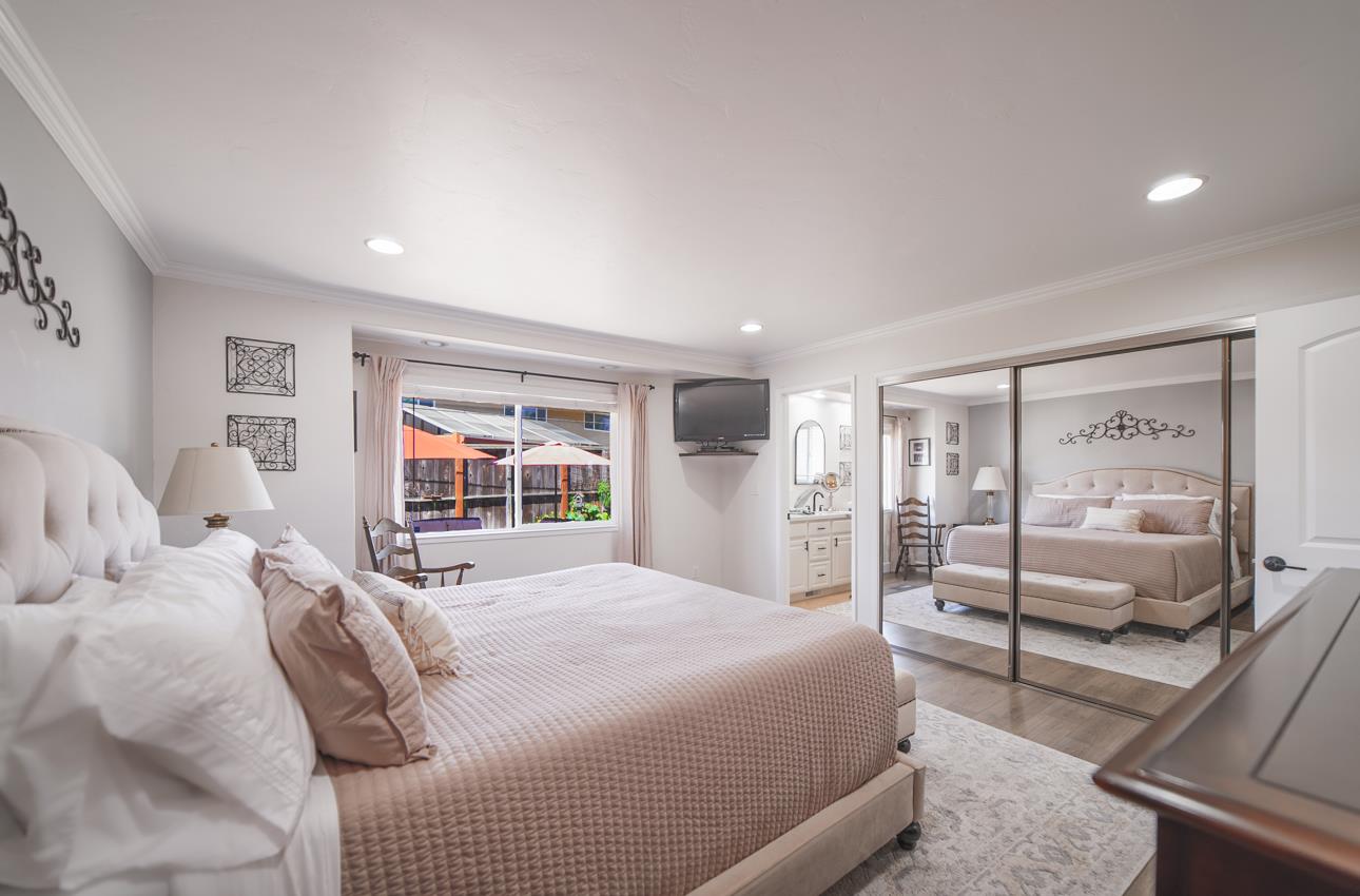 731 La Mesa Drive Salinas, CA 93901 - Photo 32 of 43 a bedroom with a large bed and a large window