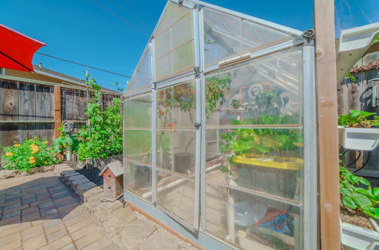 731 La Mesa Drive Salinas, CA 93901 - Photo 41 of 43 a view of a glass door with a chair and table in the patio