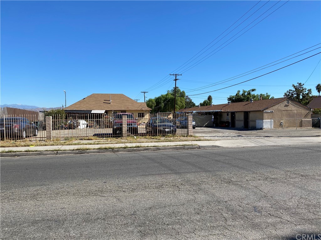 6061 Rutland Avenue Riverside, CA 92503 - Photo 1 of 1 a front view of a house with a yard