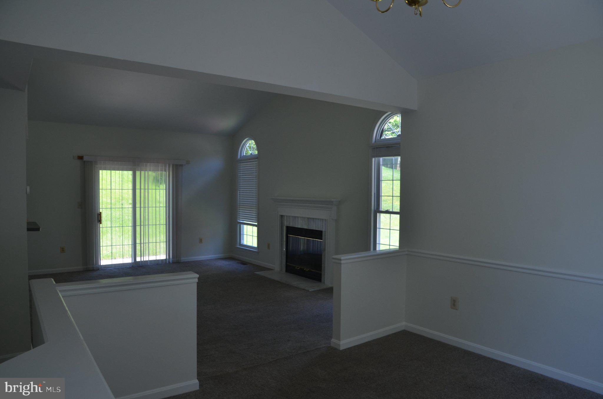 406 Longdraft Road Gaithersburg, MD 20878 - Photo 13 of 24 Spacious living area with natural light.