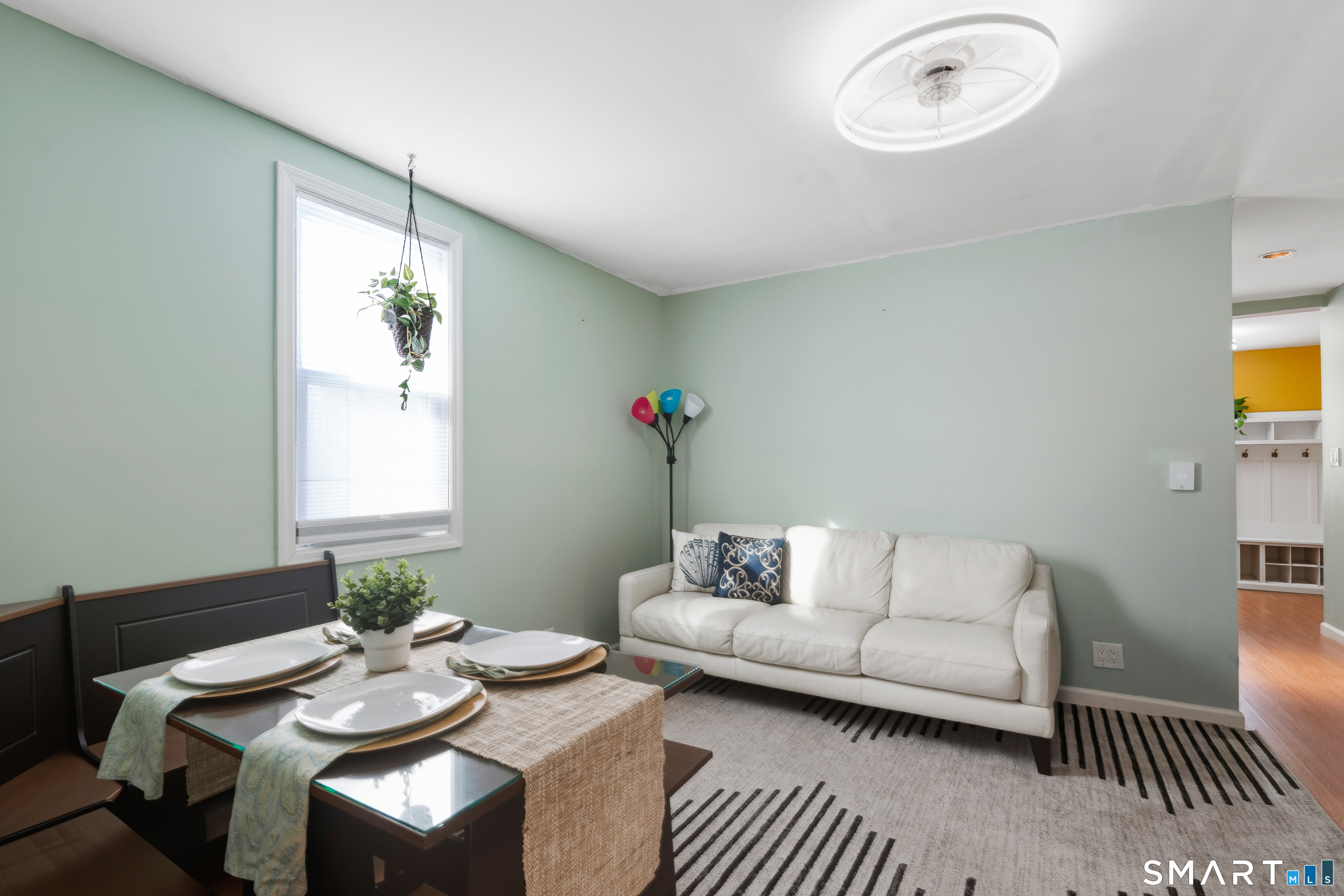 14 Bantam Road New Fairfield, CT 06812 - Photo 18 of 42 a living room with furniture and a table