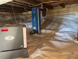 14 Bantam Road New Fairfield, CT 06812 - Photo 22 of 42 a view of a room with racks on the wall