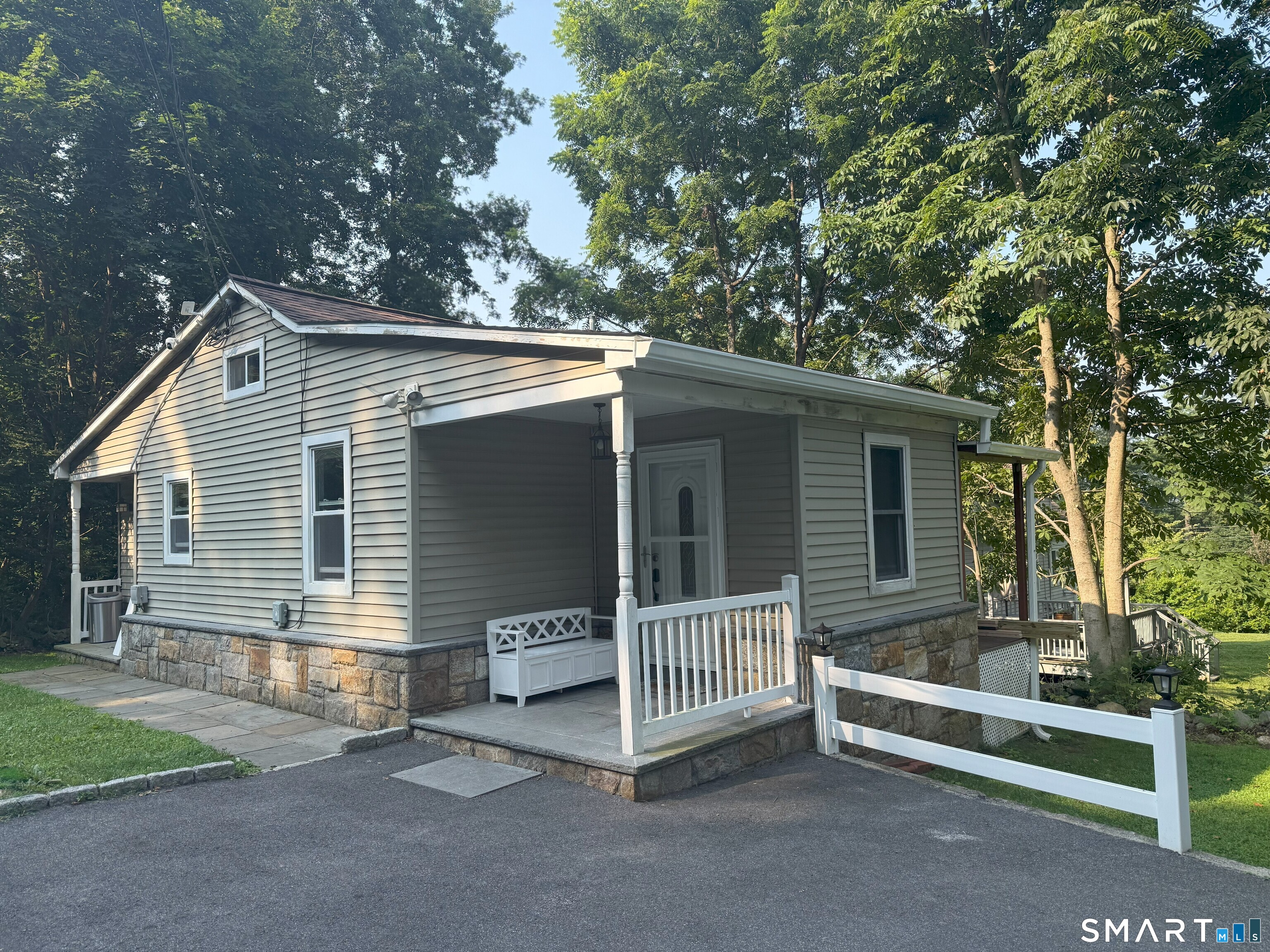14 Bantam Road New Fairfield, CT 06812 - Photo 24 of 42 a view of a house with a yard and fence