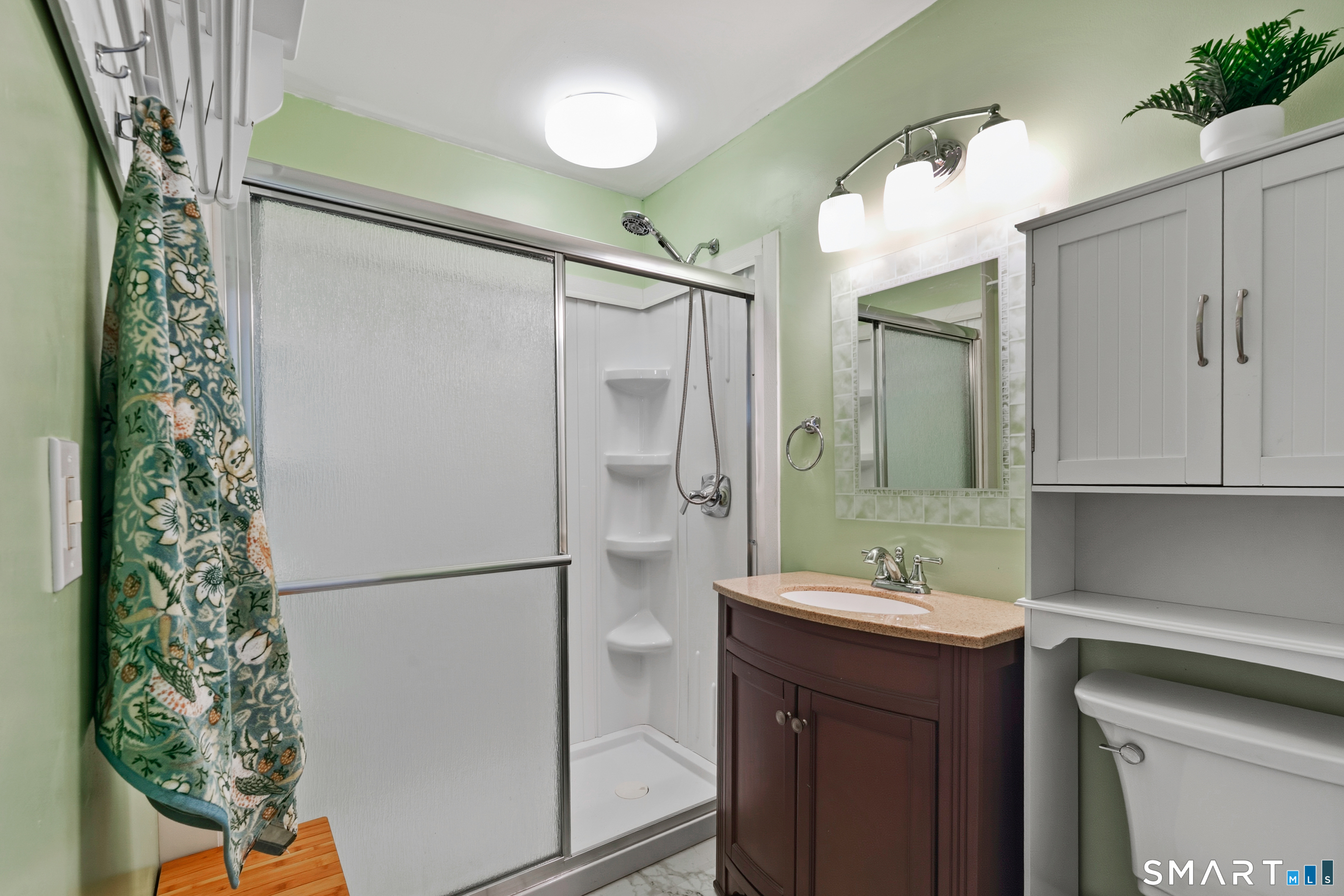 14 Bantam Road New Fairfield, CT 06812 - Photo 28 of 42 a bathroom with a sink and a mirror