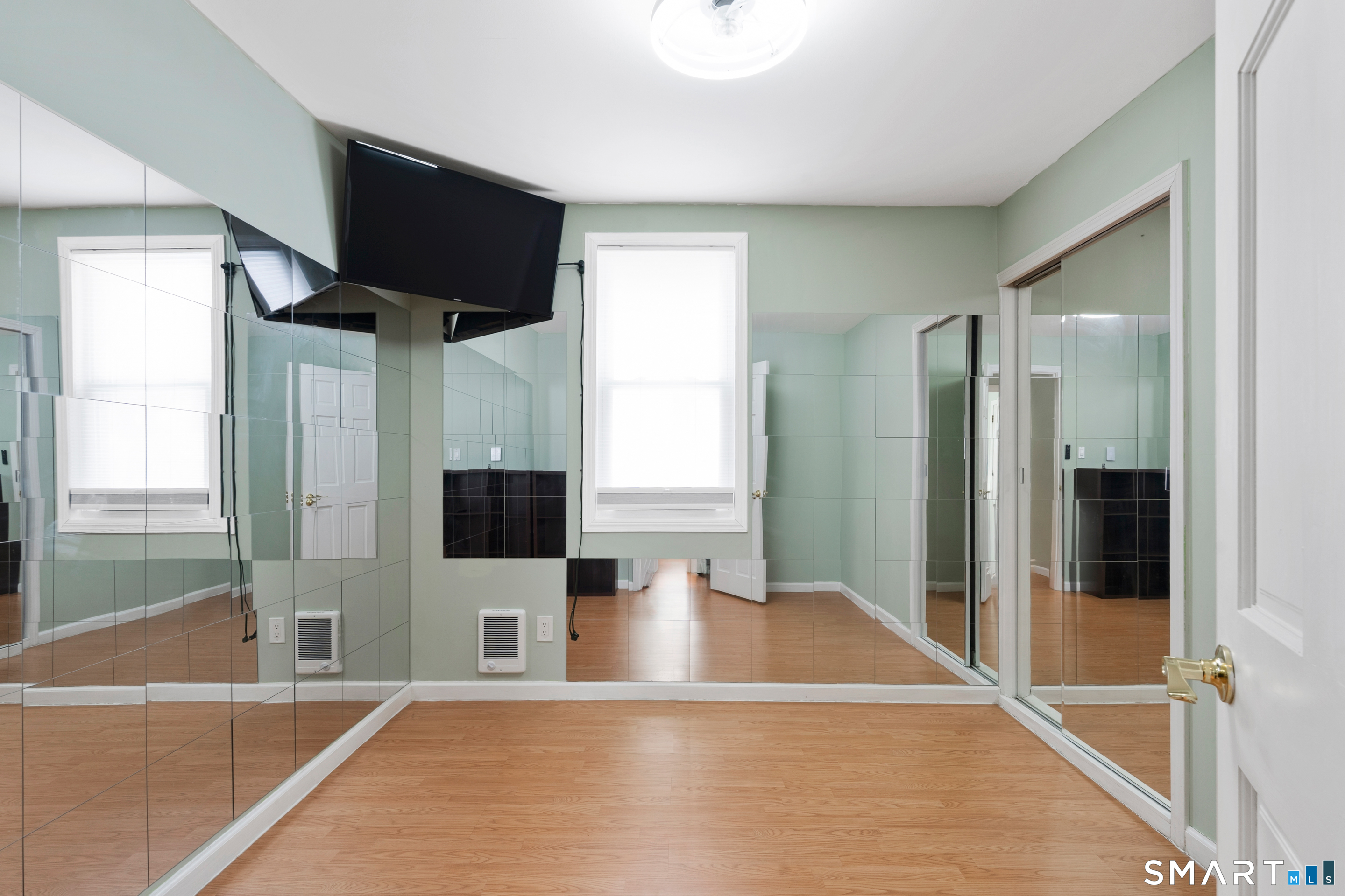 14 Bantam Road New Fairfield, CT 06812 - Photo 29 of 42 a view of a living room with a flat screen tv