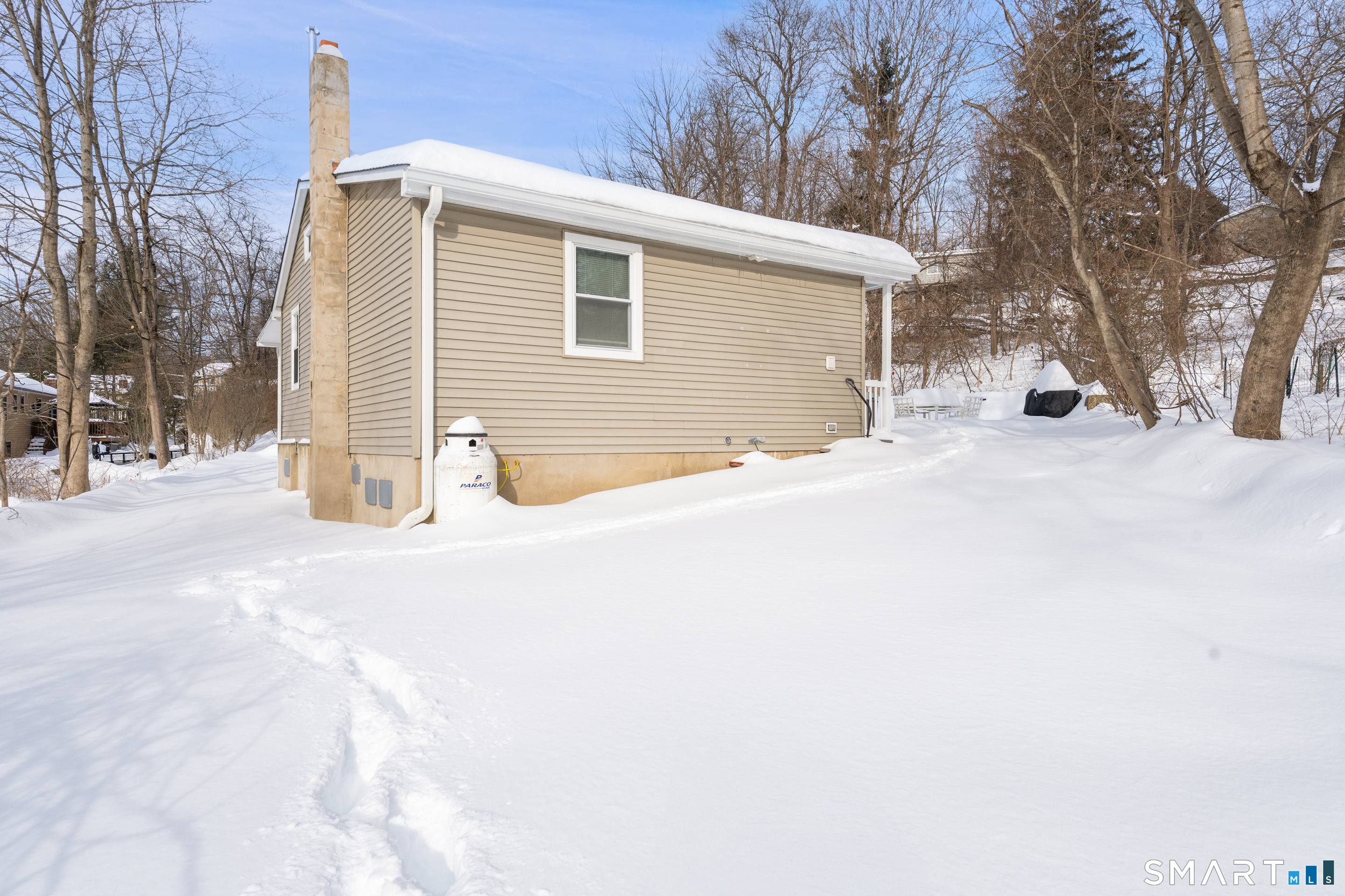 14 Bantam Road New Fairfield, CT 06812 - Photo 35 of 42 a view of a house with snow on the road