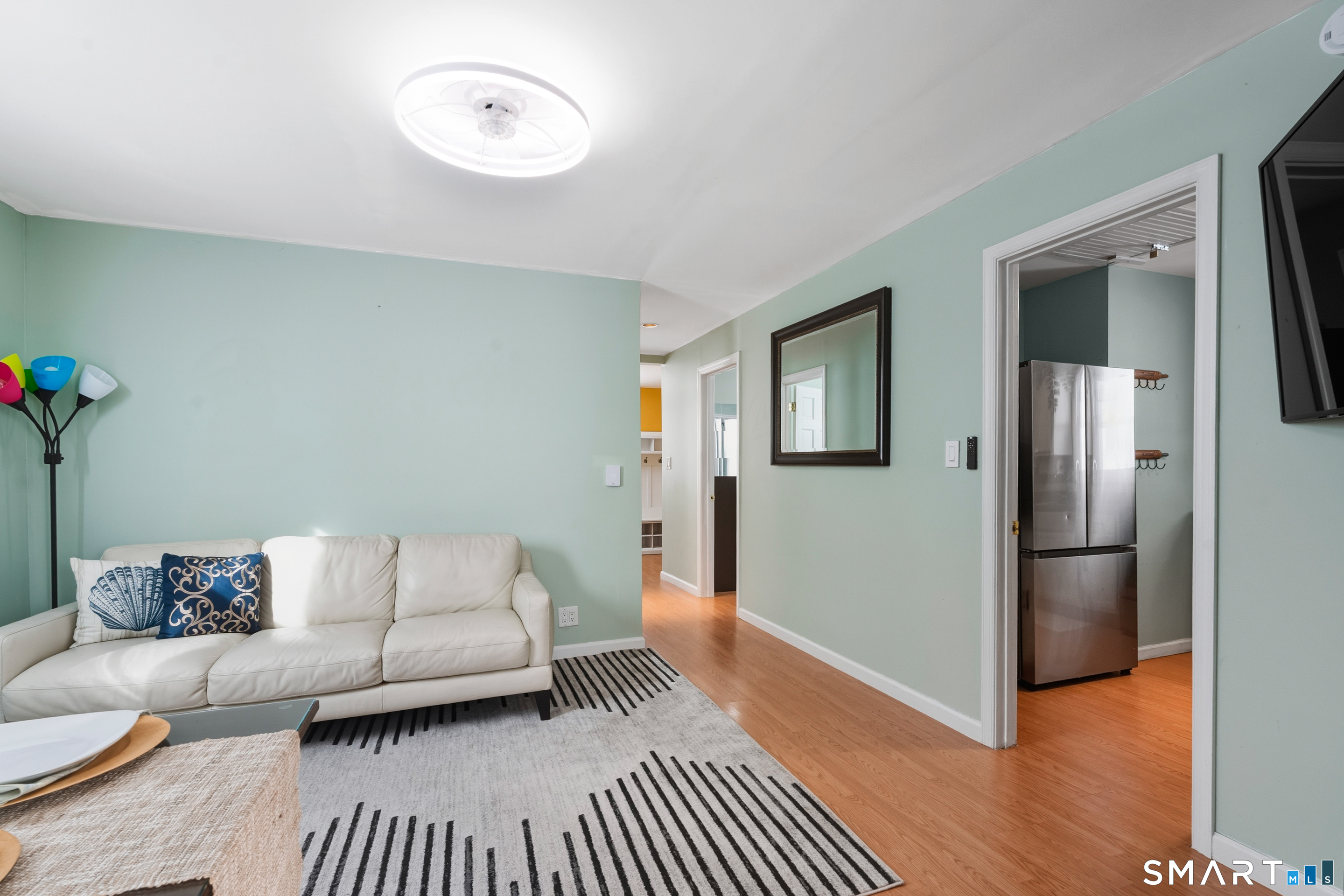 14 Bantam Road New Fairfield, CT 06812 - Photo 6 of 42 a living room with furniture and a rug