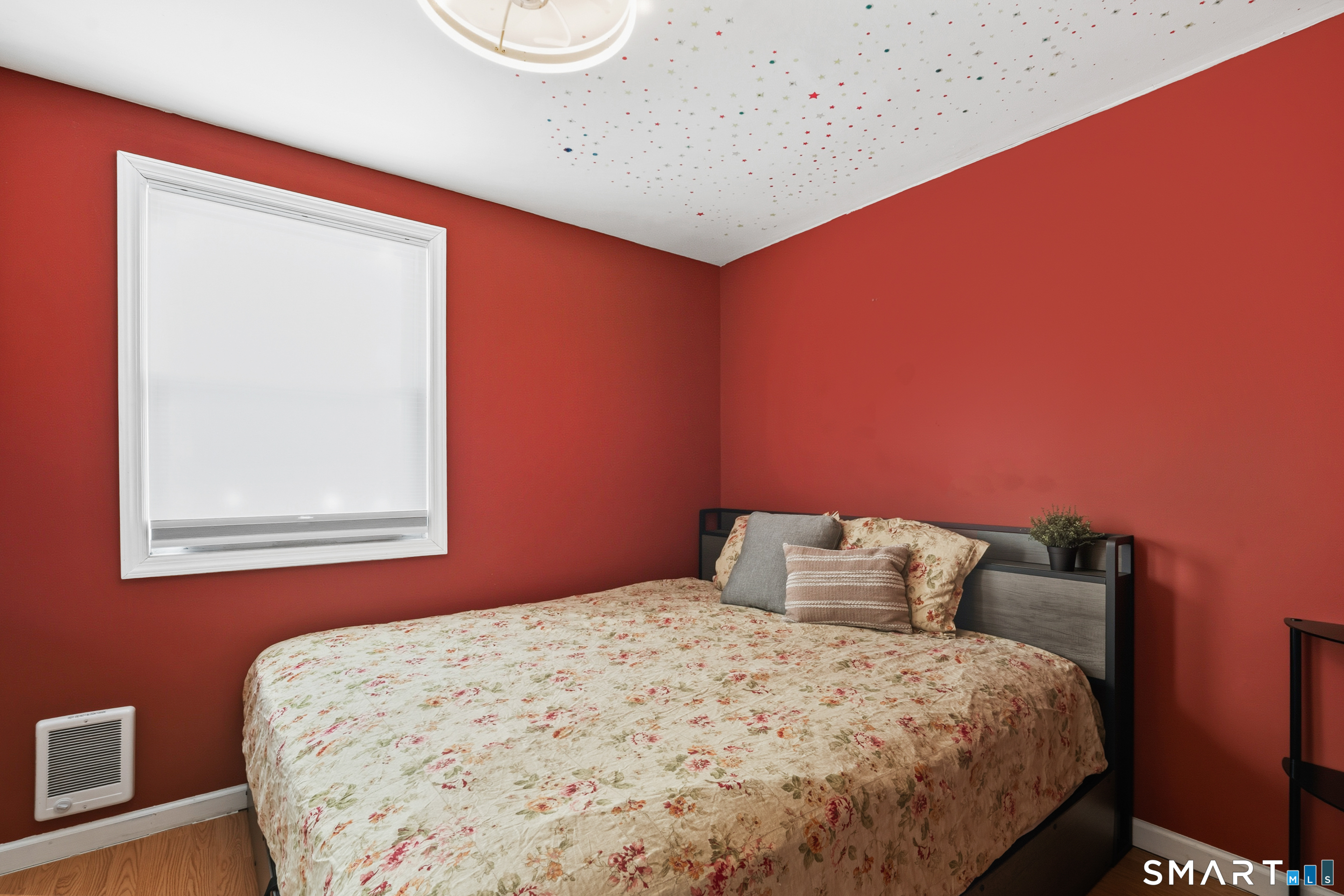 14 Bantam Road New Fairfield, CT 06812 - Photo 9 of 42 a bedroom with a bed and a window